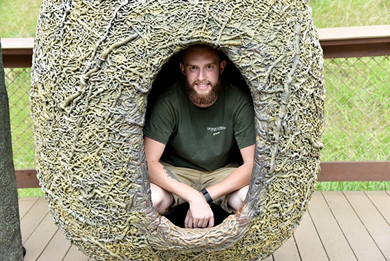 zoo keeper in nest statue