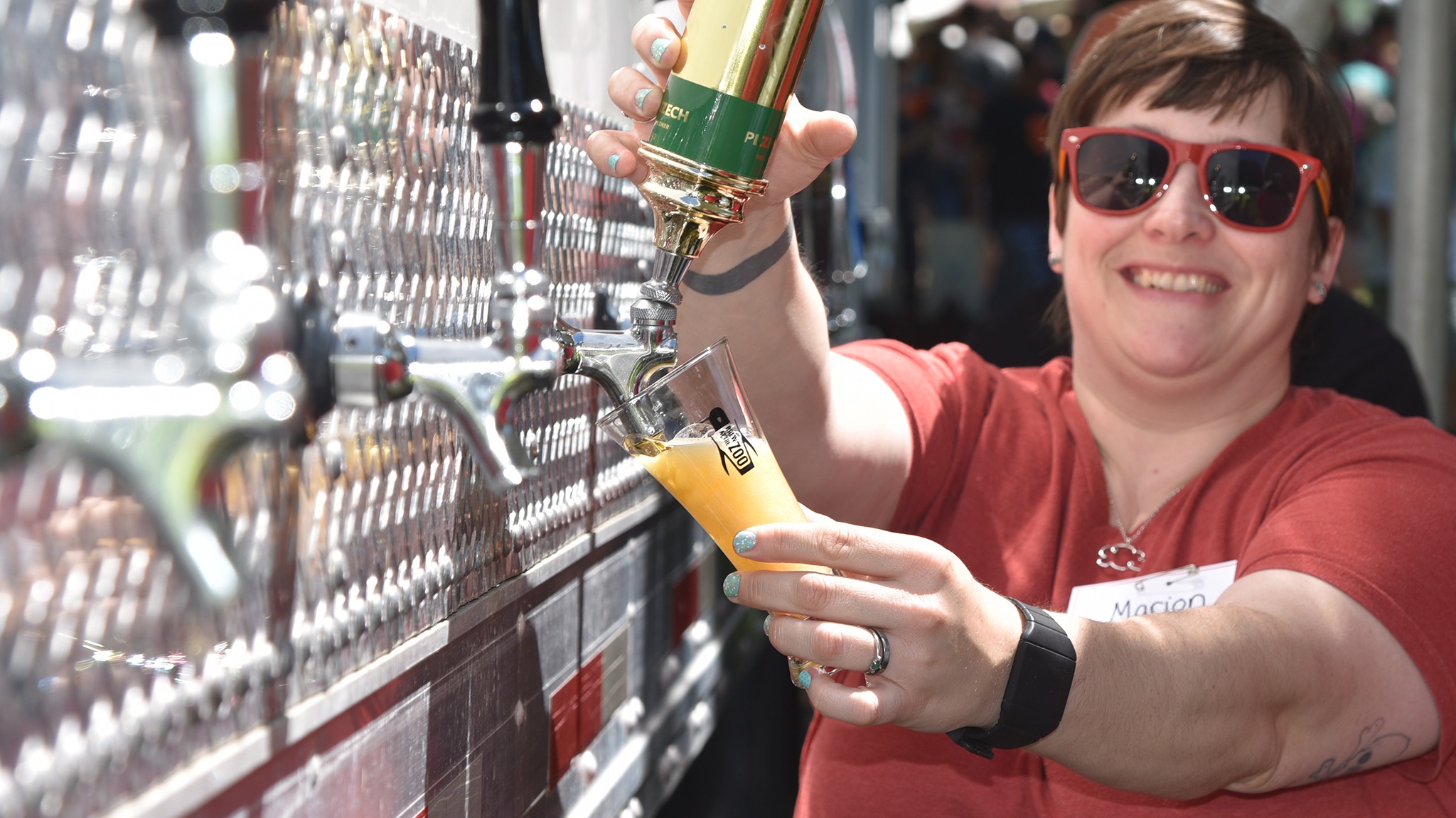 Person pouring beer