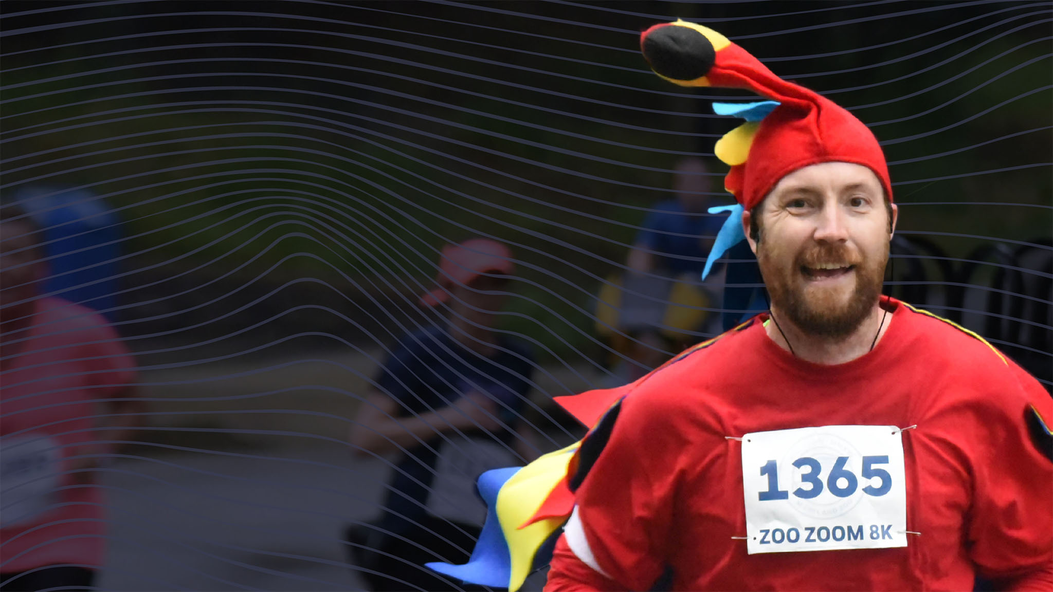 man running in a parrot costume