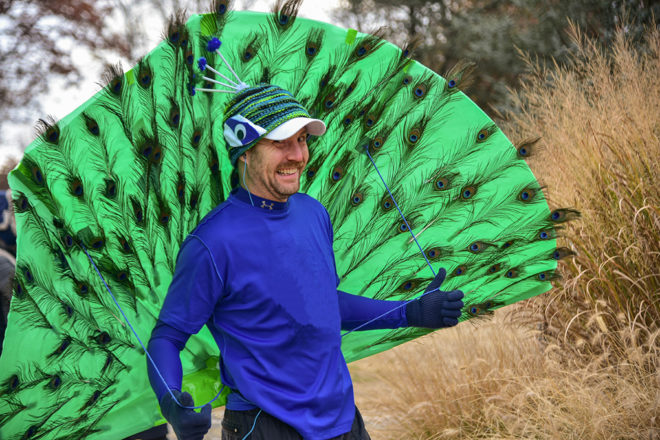 man in a peacock outfit