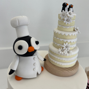 edible penguin chef made from fondant