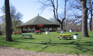 pavilion on a hill with picnic tables