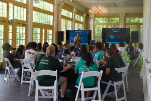 Group of guests at Corporate event listening to speaker